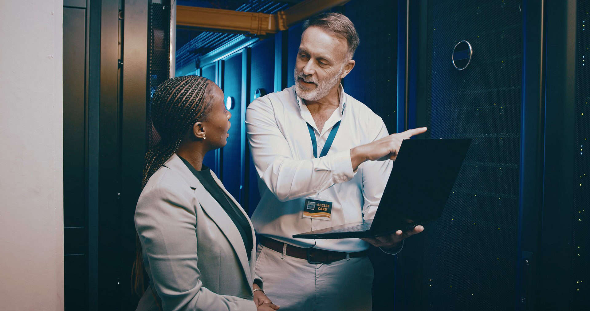 Senior network admin explaining server